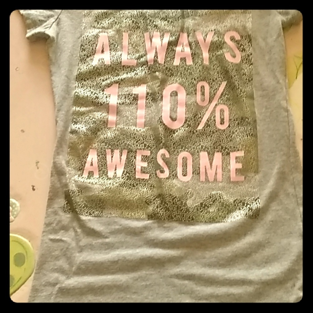 A very cute t-shirt size 10/12 for kid girls